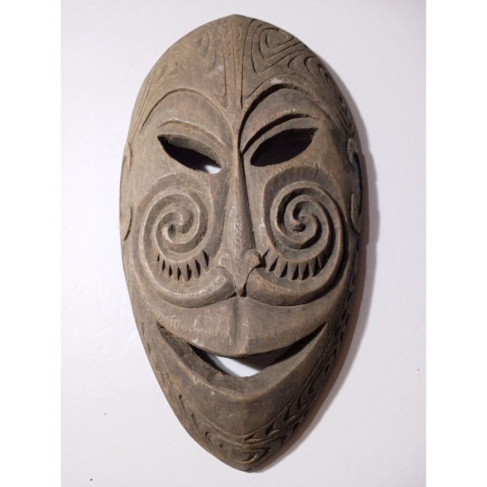 Carved Wooden Canoe Prow Mask From the Sepik River Region of Papua New Guinea